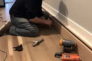 Installing baseboards in a home