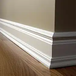 Vinyl baseboard installation in a home